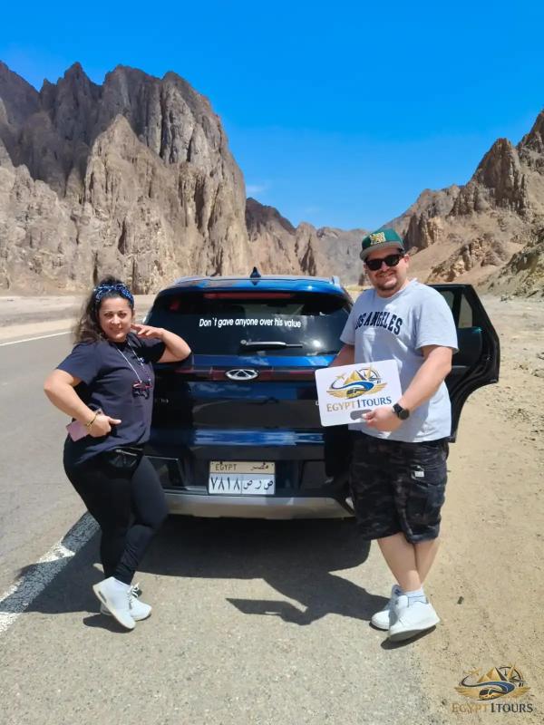 Comfortable private vehicle driving along the Red Sea coast toward Marsa Alam resort hotels