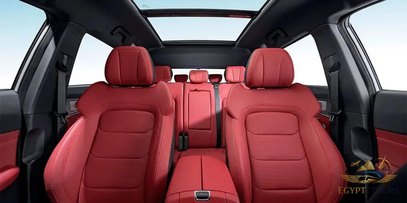 Combined interior and exterior view of a luxury air-conditioned private vehicle used for transfers between Luxor and Aswan.