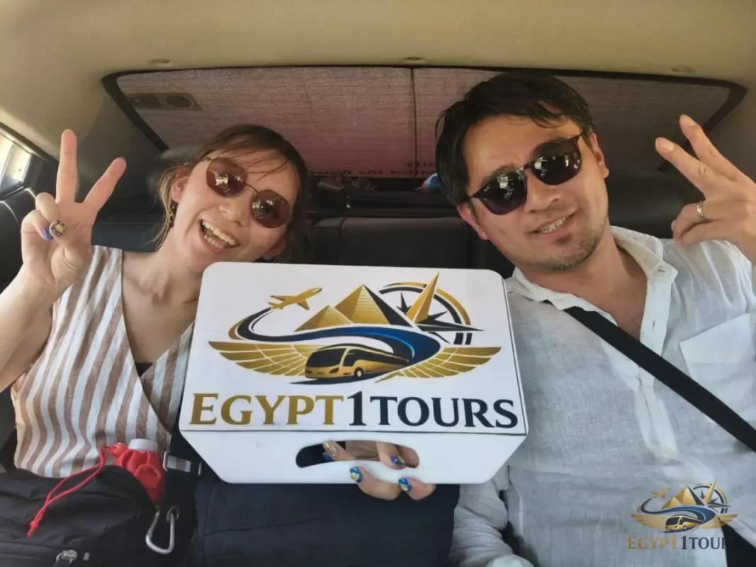 Travelers enjoying a comfortable air-conditioned ride inside Egypt 1 Tours private transfer vehicle